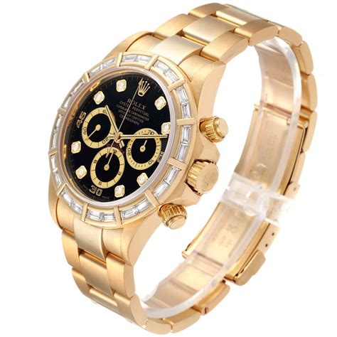 rolex daytona gold bezel.